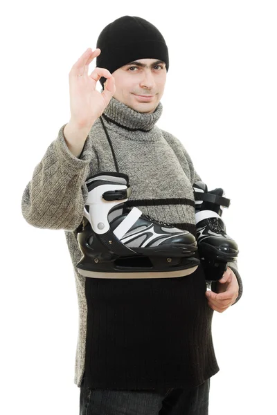 Men with skates gesture shows okay on white background — Stock Photo, Image