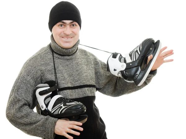 Man met schaatsen op witte achtergrond. — Stockfoto