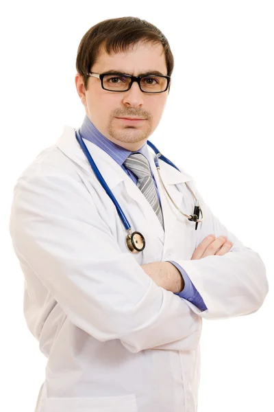 Egy orvos a sztetoszkóppal és szemüveg forgalomba a kezét keresztben a whi — Stock Fotó