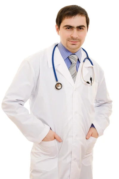 En läkare med ett stetoskop på vit bakgrund. — Stockfoto
