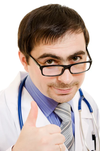 Лікар зі стетоскопом і жестом окулярів показує добре на білому фоні — стокове фото