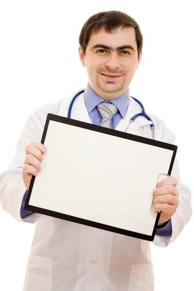 Medico maschio con un foglio di carta bianco su sfondo bianco . — Foto Stock