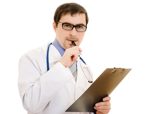 Médico masculino escreve na tabela de documentos em um fundo branco . — Fotografia de Stock