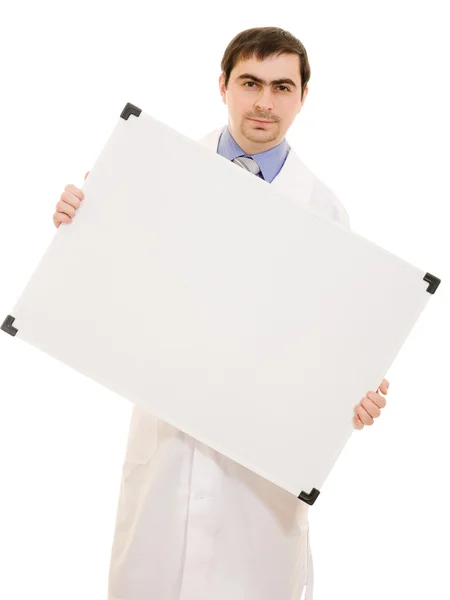 Mannlig lege med en hvit planke på hvit bakgrunn . – stockfoto