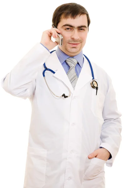 Чоловік лікар розмовляє по телефону на білому тлі . — стокове фото