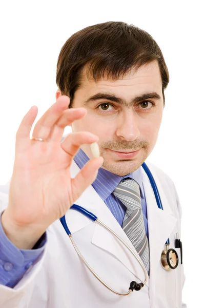 Kendine güvenen kıdemli doktor reçeteli ilaç WHI karşı gösterilen — Stok fotoğraf