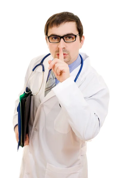 Een arts met een stethoscoop en een map op een witte achtergrond. — Stockfoto