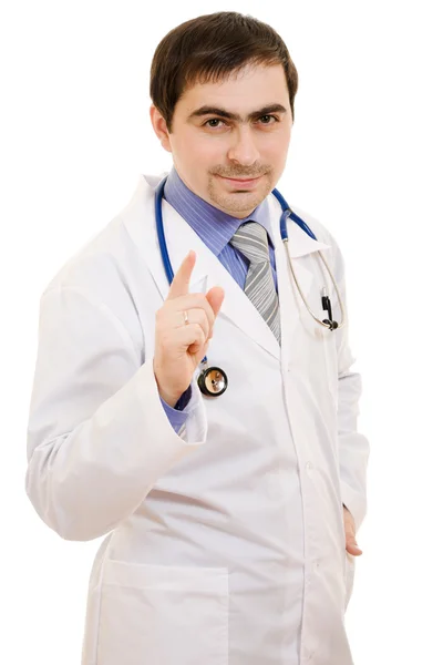 En läkare med ett stetoskop på vit bakgrund. Stockbild