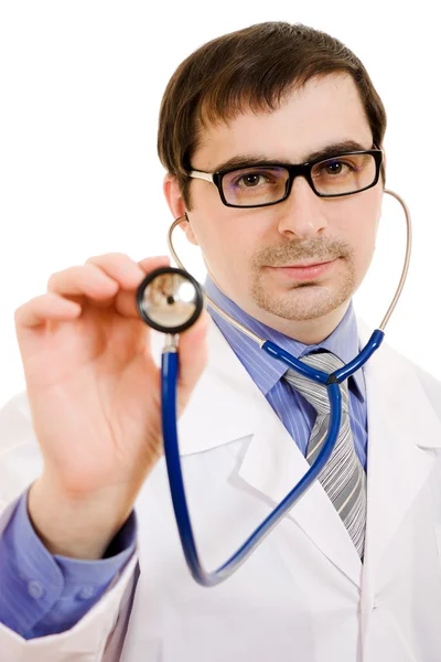 Medico con stetoscopio su sfondo bianco. Immagine Stock