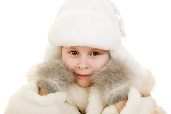 La chica en ropa de abrigo sonriendo sobre fondo blanco . — Foto de Stock