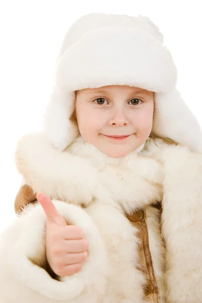 Menina em um gesto de roupas quentes mostra tudo bem em um fundo branco . — Fotografia de Stock