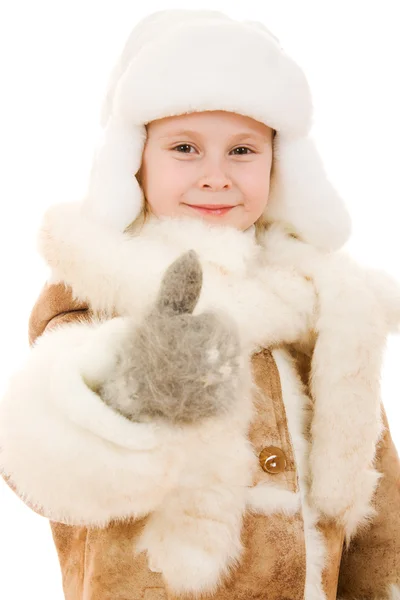 Egy gesztus, meleg ruhát a lány mutatja rendben van egy fehér háttér. — Stock Fotó