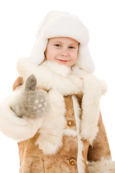 Chica en un gesto de ropa de abrigo muestra bien sobre un fondo blanco . —  Fotos de Stock