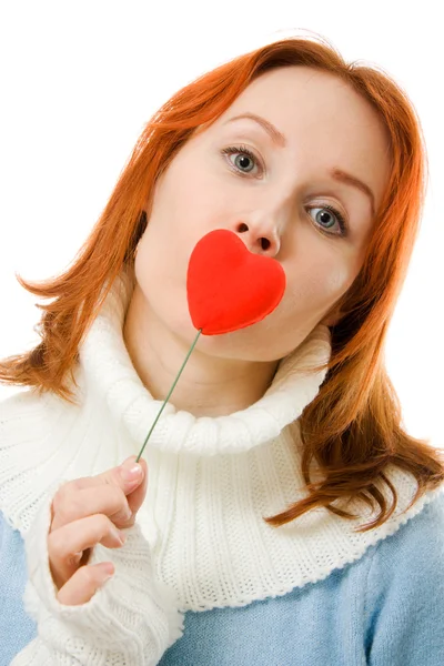 Flickan skickar en luft kiss i form av hjärtat på en vit bakgrund. — Stockfoto