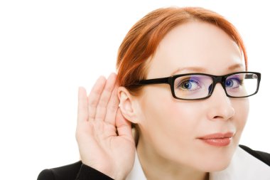 Close up of woman's hand to his ear .