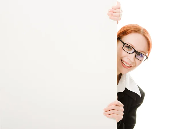 Mujer de negocios con gafas escondidas detrás de una hoja de papel blanco — Foto de Stock
