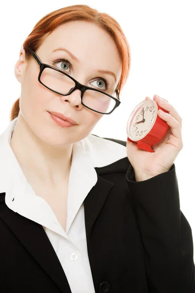 Businesswoman wearing glasses listening clock . — 스톡 사진