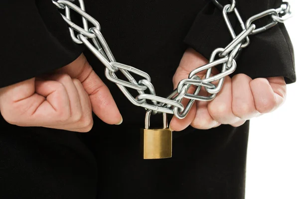 Businesswoman with hands shackled in chains. — Stock Photo, Image