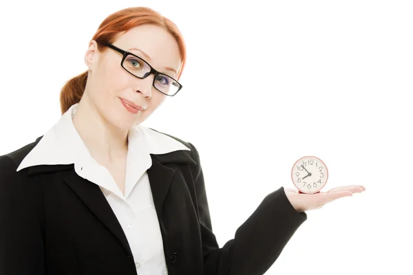 Pretty smiling woman holding a clock — Stock Photo, Image