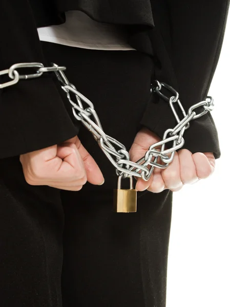 stock image Businesswoman with hands shackled in chains.