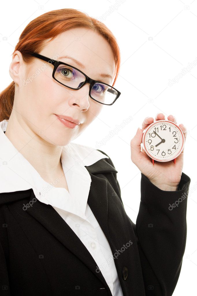 Pretty smiling woman holding a clock