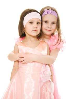 Two girlfriends hugging dresses in pink clipart