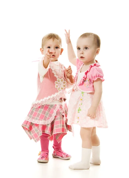 Two beautiful baby in the pink dress — Stock Photo, Image