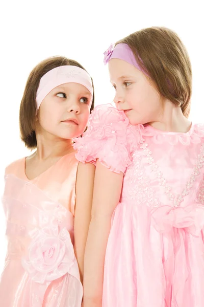 Dva přátelé v růžových šatech — Stock fotografie
