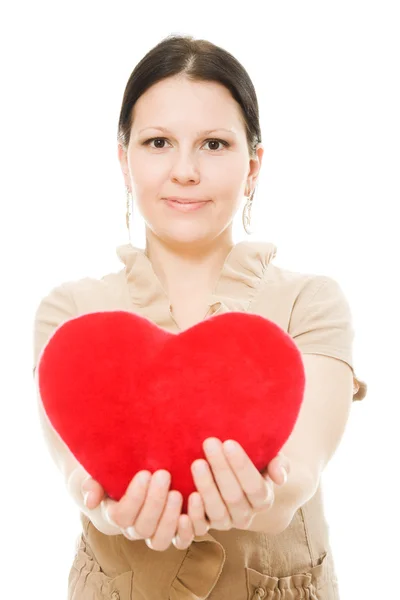 Γυναίκα με μια καρδιά σε λευκό φόντο. — Φωτογραφία Αρχείου