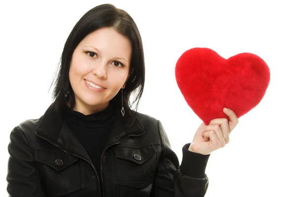 Woman with a heart on a white background. — Stock Photo, Image