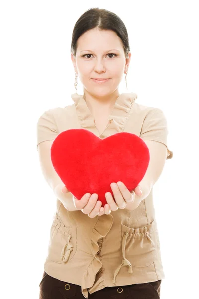 Woman with a heart on a white background. — Stock Photo, Image