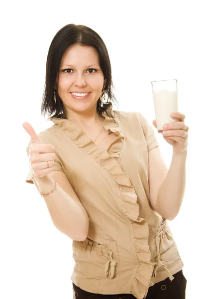 Vrouw consumptiemelk op een witte achtergrond. — Stockfoto