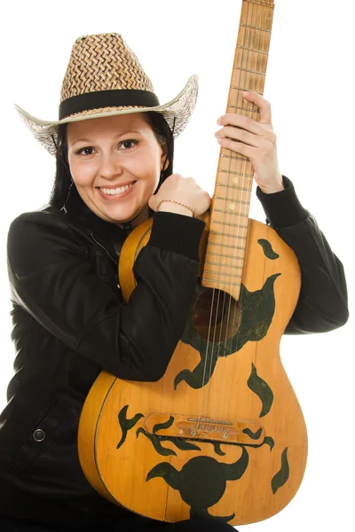 Cowgirl w kapelusz z gitarą akustyczną — Zdjęcie stockowe