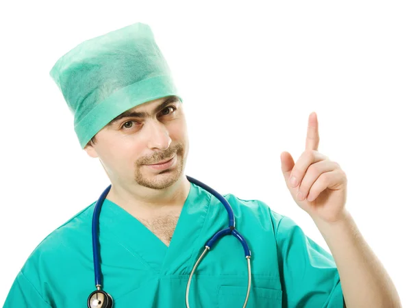 Mužské chirurg směřující nahoru — Stock fotografie
