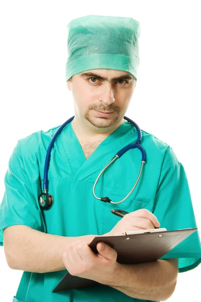 Αρσενικό χειρουργός γράφει για το δισκίο — Φωτογραφία Αρχείου