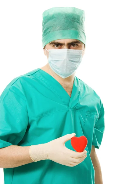 Medico maschio con un cuore in mano — Foto Stock