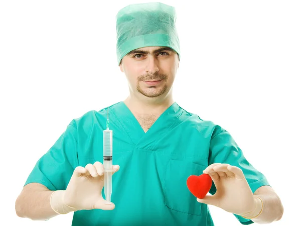 Arts met een hart en spuit in zijn hand — Stockfoto
