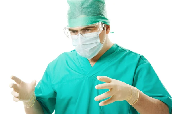 男性外科医生戴上口罩和手套，在白色背景上. — 图库照片