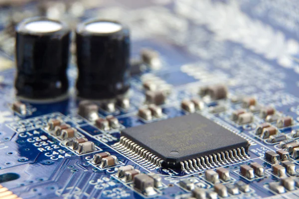 Electronic chip on circuit board — Stock Photo, Image
