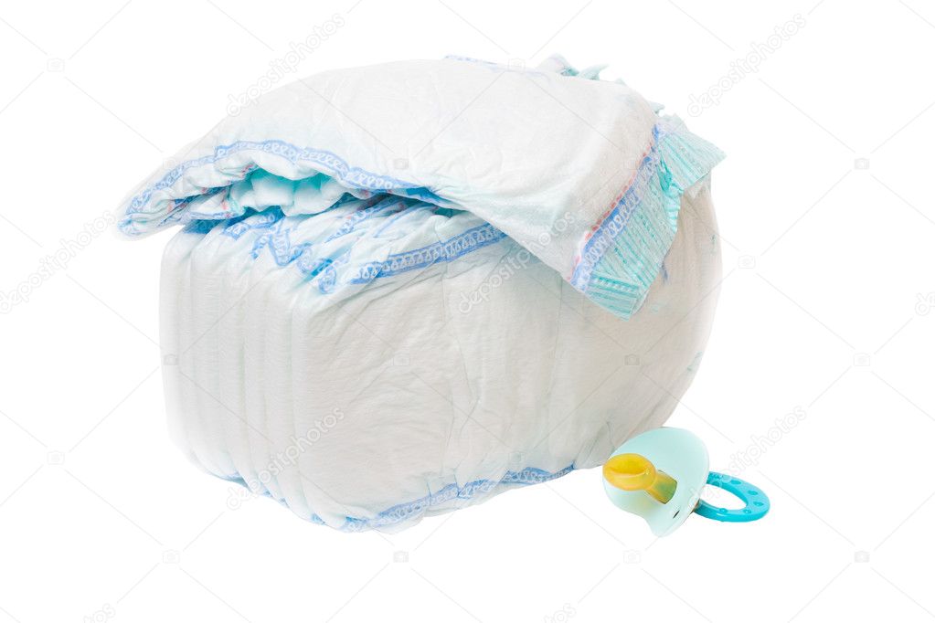 The pile of diapers and baby's dummy