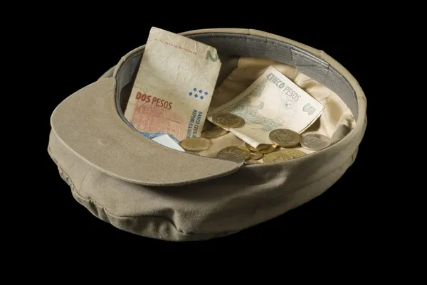 Sombrero y dinero Imagen De Stock