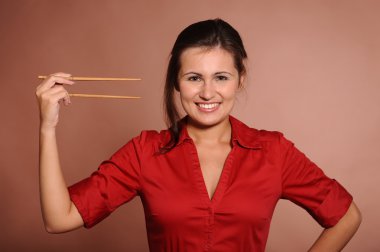 Woman with chopsticks