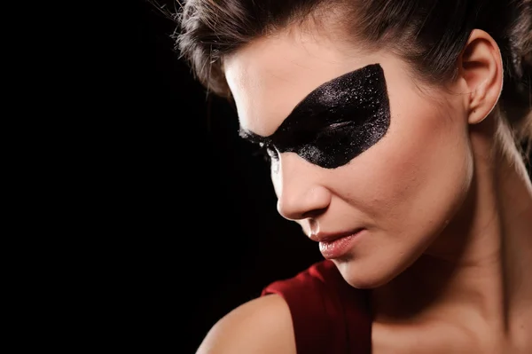 Sexy woman with black party mask on face — Stock Photo, Image