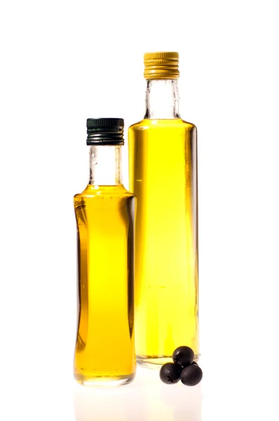 Due bottiglie chiuse di olio d'oliva — Foto Stock