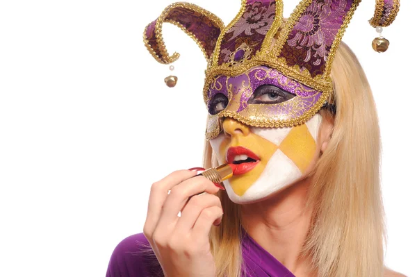 Žena ve fialové karnevalové masky — Stock fotografie