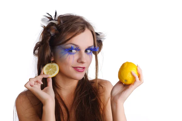 Woman with lemon earring — Stock Photo, Image
