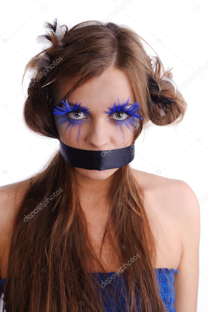 Woman with fashion make-up and black ribbon on the mouth