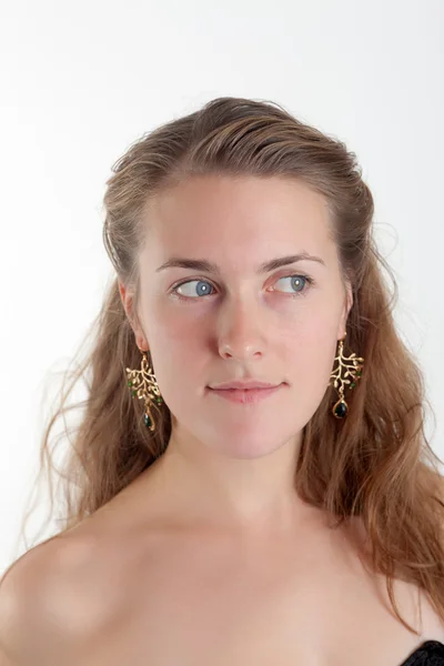 Girl in beautiful earrings — Stock Photo, Image