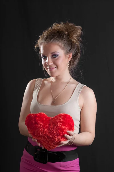 Meisje met een rood hart — Stockfoto