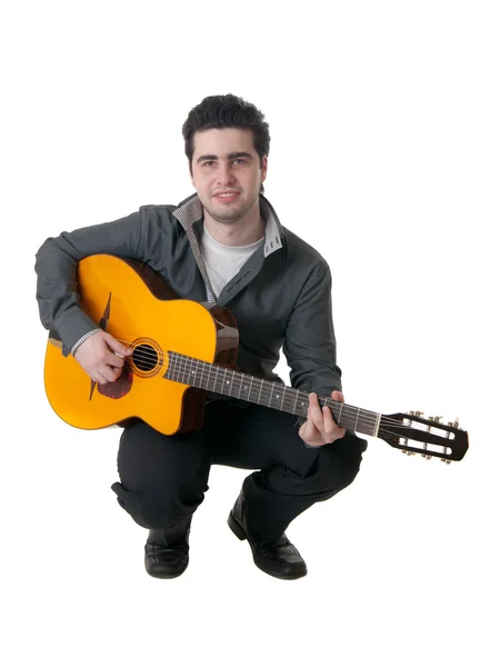 The musician plays an acoustic guitar — Stock Photo, Image